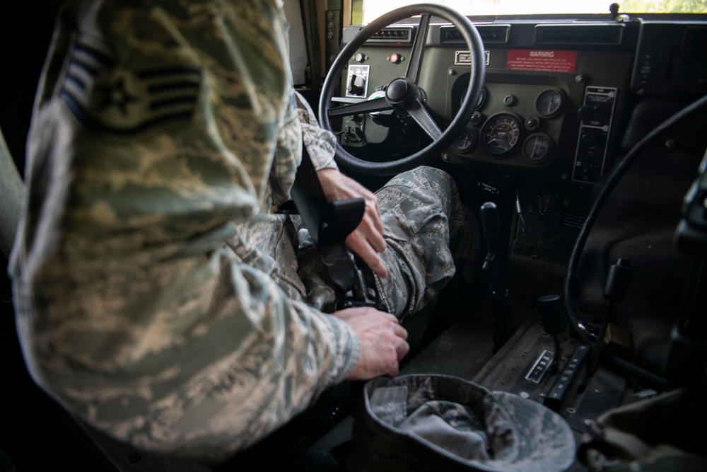 Humvee driving with 932nd CES