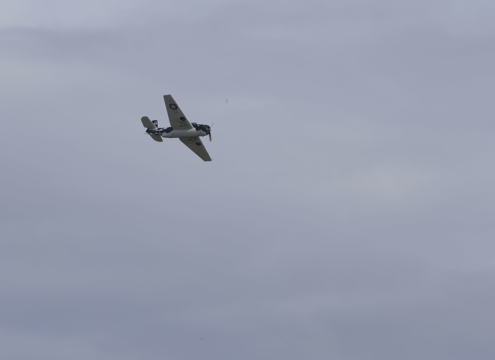 WWII-Era Warbirds Fly Over the Pearl Harbor