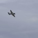WWII-Era Warbirds Fly Over the Pearl Harbor