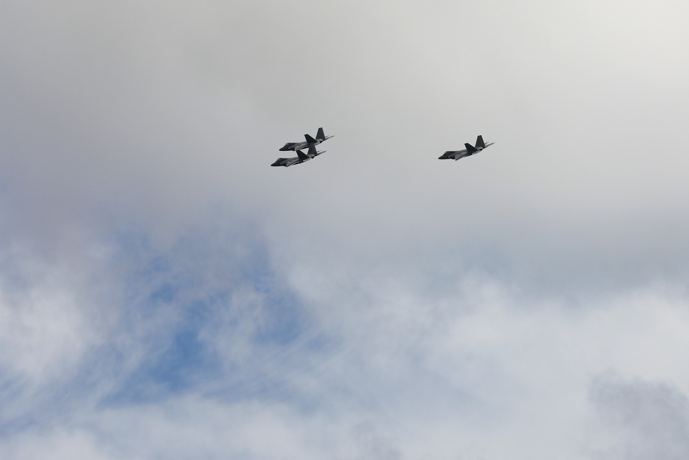 F22 Raptors Fly Over USS Missouri