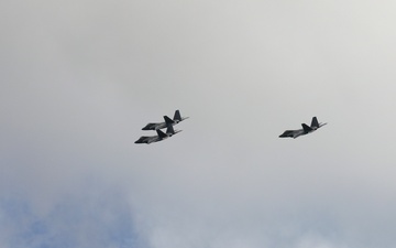 F22 Raptors Fly Over USS Missouri