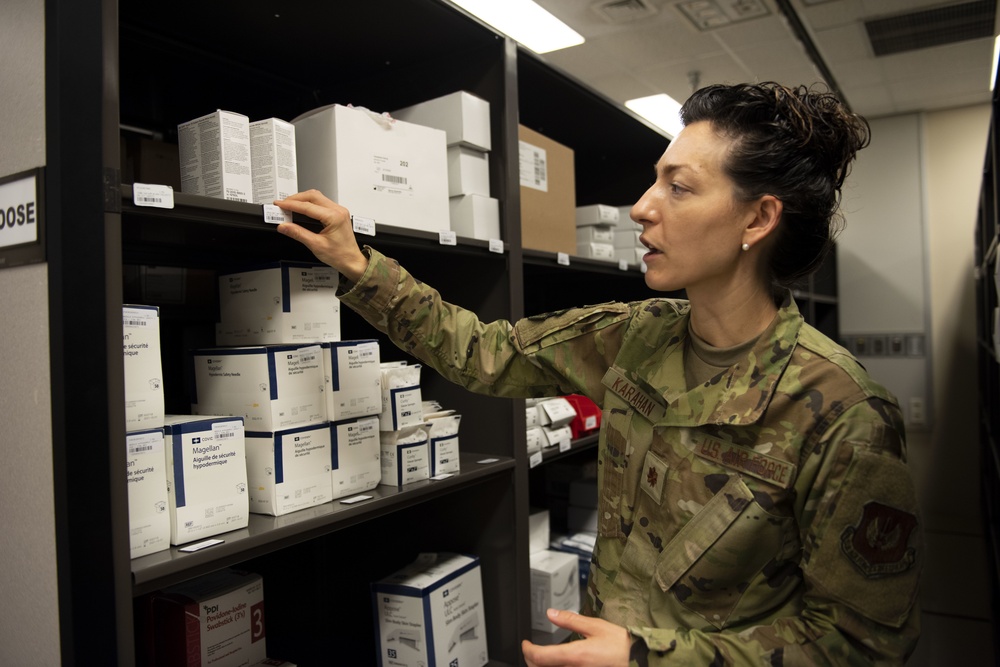 Maj. Karahan checks the medical storeroom shelves