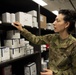 Maj. Karahan checks the medical storeroom shelves