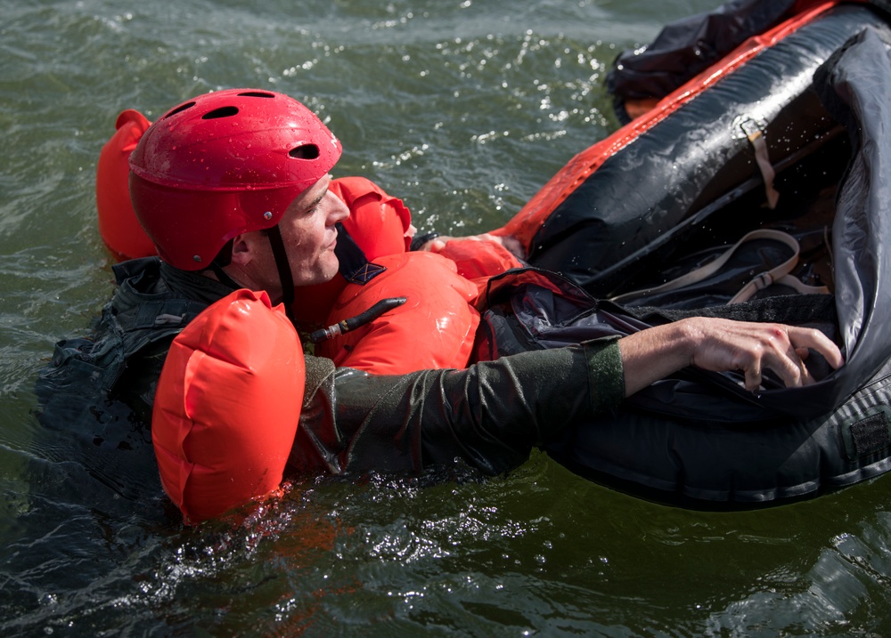 Air Commandos dip into parachuting and water survival training