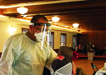 Michigan National Guard conducts cost-free COVID-19 walk-thru tests on Mackinac Island