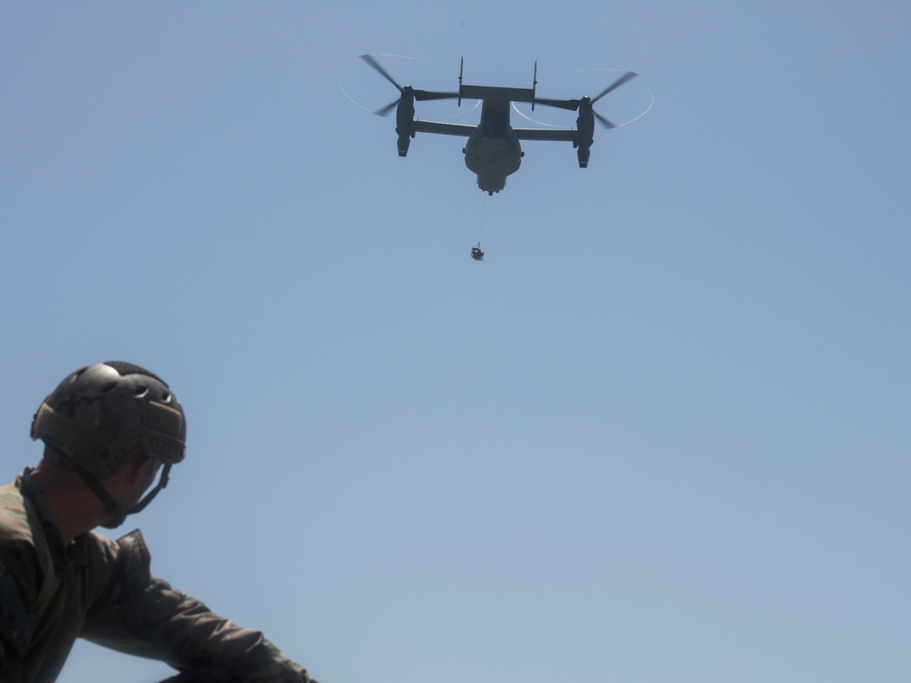 SERE specialists connect with Ospreys, conduct rescue hoist operations