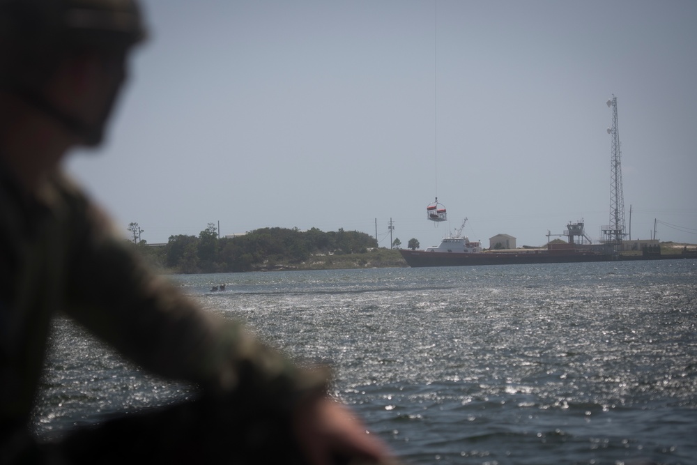 SERE specialists connect with Ospreys, conduct rescue hoist operations