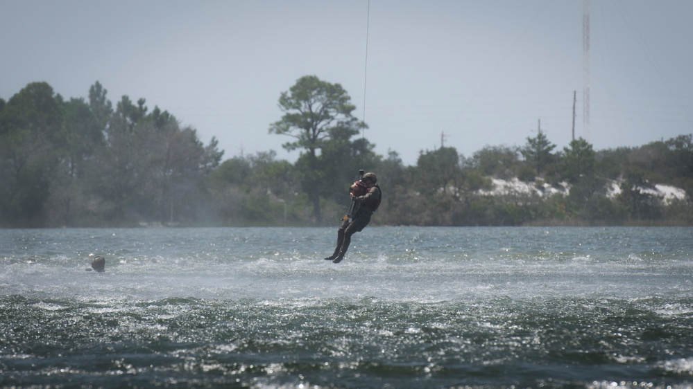SERE specialists connect with Ospreys, conduct rescue hoist operations