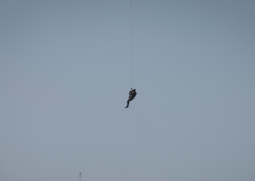 SERE specialists connect with Ospreys, conduct rescue hoist operations