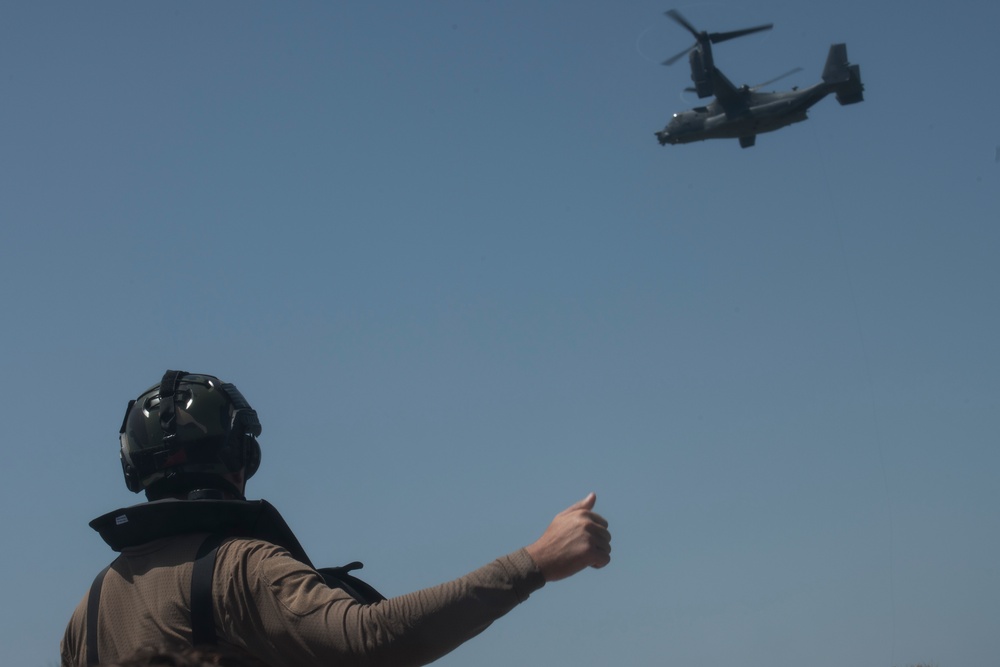 SERE specialists connect with Ospreys, conduct rescue hoist operations