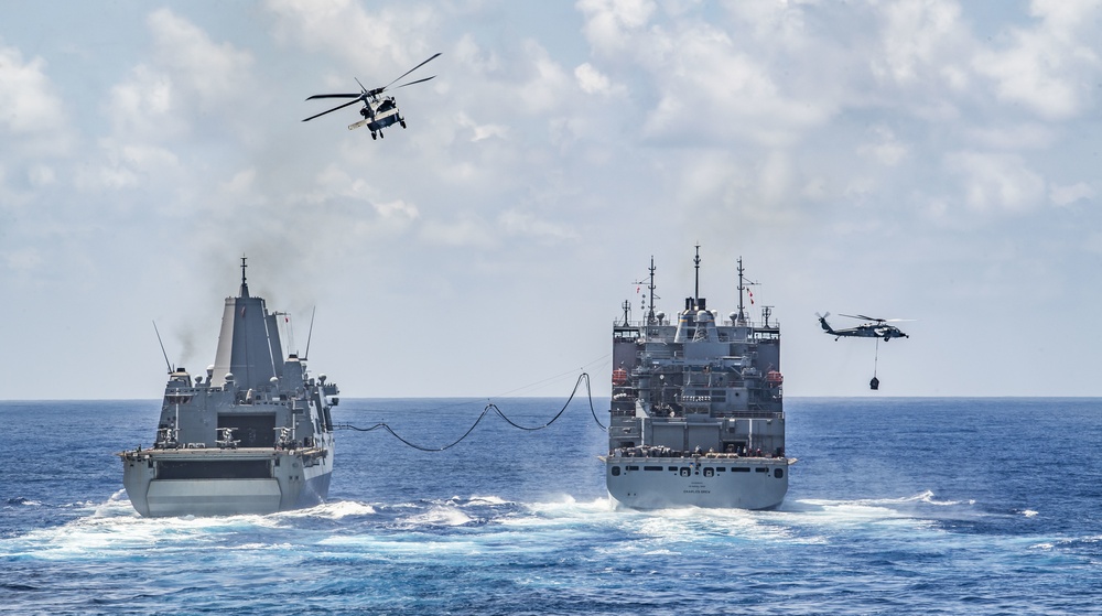 USS America (LHA 6) and USS New Orleans (LPD 18) Conduct a Replenishment-at-Sea with USNS Charles Drew (T-AKE 10)