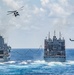 USS America (LHA 6) and USS New Orleans (LPD 18) Conduct a Replenishment-at-Sea with USNS Charles Drew (T-AKE 10)