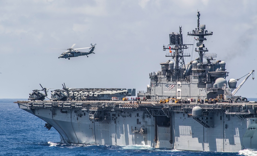 USS America (LHA 6) and USS New Orleans (LPD 18) Conduct a Replenishment-at-Sea with USNS Charles Drew (T-AKE 10)