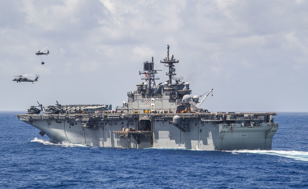 USS America (LHA 6) and USS New Orleans (LPD 18) Conduct a Replenishment-at-Sea with USNS Charles Drew (T-AKE 10)