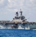 USS America (LHA 6) and USS New Orleans (LPD 18) Conduct a Replenishment-at-Sea with USNS Charles Drew (T-AKE 10)