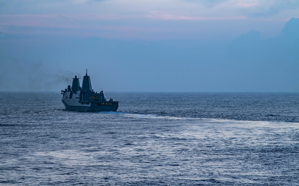 USS America (LHA 6) and USS New Orleans (LPD 18) Conduct a Replenishment-at-Sea with USNS Charles Drew (T-AKE 10)