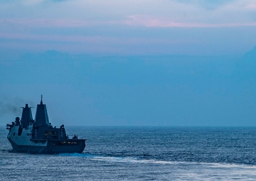 USS America (LHA 6) and USS New Orleans (LPD 18) Conduct a Replenishment-at-Sea with USNS Charles Drew (T-AKE 10)