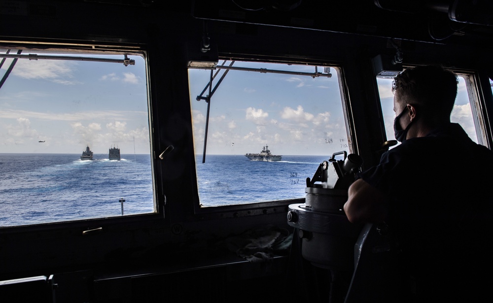 USS America (LHA 6) and USS New Orleans (LPD 18) Conduct a Replenishment-at-Sea with USNS Charles Drew (T-AKE 10)