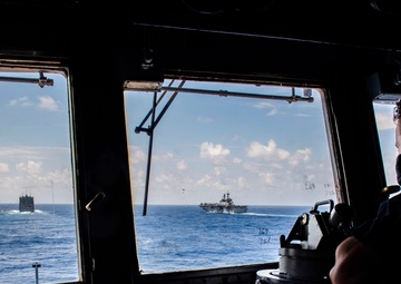 USS America (LHA 6) and USS New Orleans (LPD 18) Conduct a Replenishment-at-Sea with USNS Charles Drew (T-AKE 10)