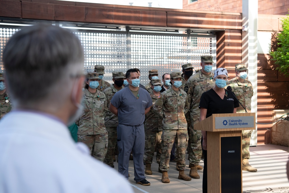 Soldiers from the Urban Augmentation Medical Task Force - 627 meet with hospital staff at Baptist Medical Center