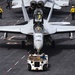 Sailors Taxi An F/A-18E Super Hornet Across The Flight Deck Aboard Nimitz