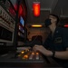 Interior Communications Electrician Monitors Production Aboard Aircraft Carrier USS Nimitz CVN 68