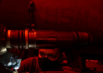 Aviation Machinist's Mate Sands Gouge In Pitch Horn Of MH-60R Sea Hawk Helicopter, From &quot;Battlecats&quot; of Helicopter Maritime Strike Squadron (HSM) 73, In Hangar Bay Aboard Aircraft Carrier USS Nimitz CVN 68