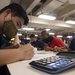 Sailors Take The E-6 Exam Aboard Nimitz