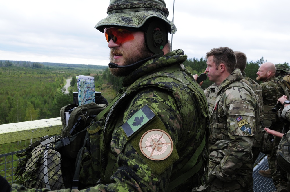 Soldiers assigned 1st Battalion, 6th Field Artillery Regiment work with Estonian Defense Force during their first live fire exercise outside of Germany.