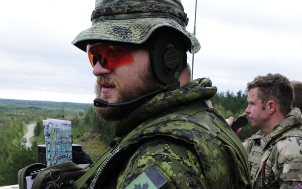Soldiers assigned 1st Battalion, 6th Field Artillery Regiment work with Estonian Defense Force during their first live fire exercise outside of Germany.