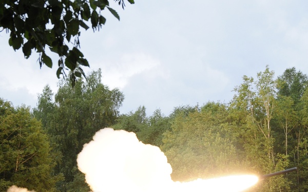 Soldiers assigned 1st Battalion, 6th Field Artillery Regiment work with Estonian Defense Force during their first live fire exercise outside of Germany.