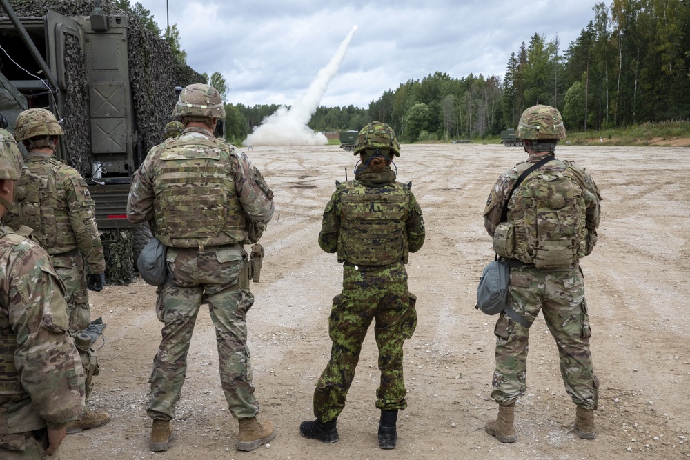 Soldiers assigned 1st Battalion, 6th Field Artillery Regiment work with Estonian Defense Force during their first live fire exercise outside of Germany.