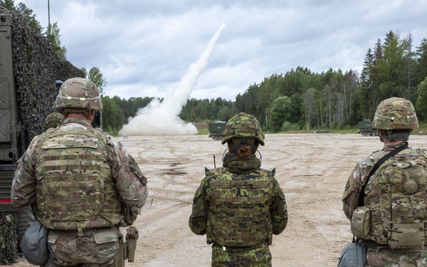 Soldiers assigned 1st Battalion, 6th Field Artillery Regiment work with Estonian Defense Force during their first live fire exercise outside of Germany.