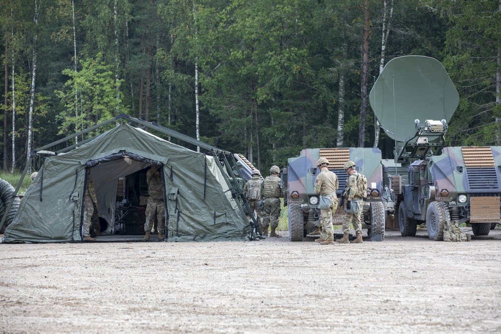 Soldiers assigned 1st Battalion, 6th Field Artillery Regiment work with Estonian Defense Force during their first live fire exercise outside of Germany.