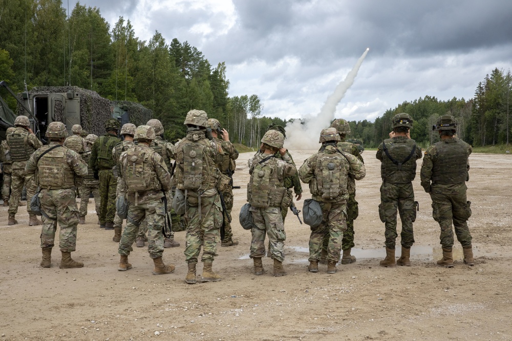 Soldiers assigned 1st Battalion, 6th Field Artillery Regiment work with Estonian Defense Force during their first live fire exercise outside of Germany.