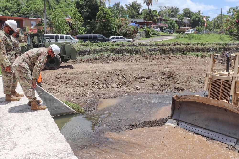 Cleaning and Dereadging Coamo River