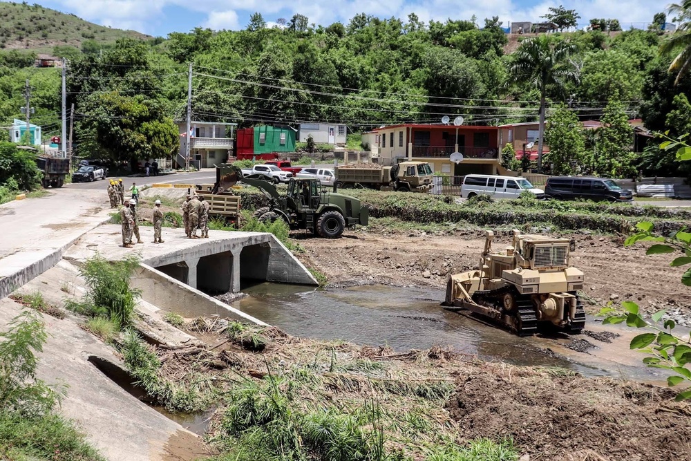 Cleaning and Dereadging Coamo River