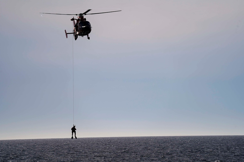 U.S. Coast Guard Cutter Campbell practices search and rescue drills off the coast of Greenland.