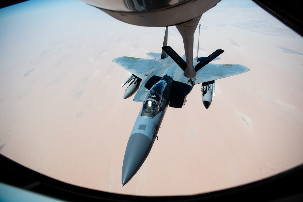 A U.S. Air Force KC-135 Stratotanker refuels F-15C Eagles