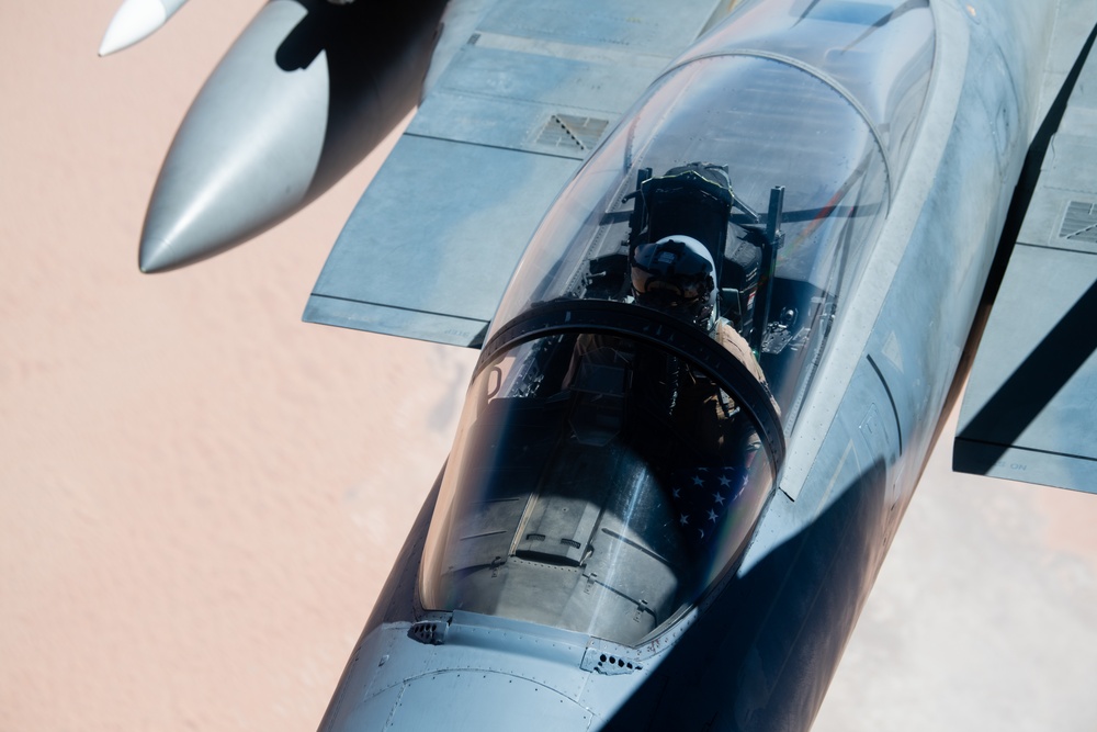 A U.S. Air Force KC-135 Stratotanker refuels F-15C Eagles