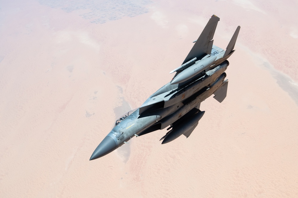 A U.S. Air Force KC-135 Stratotanker refuels F-15C Eagles