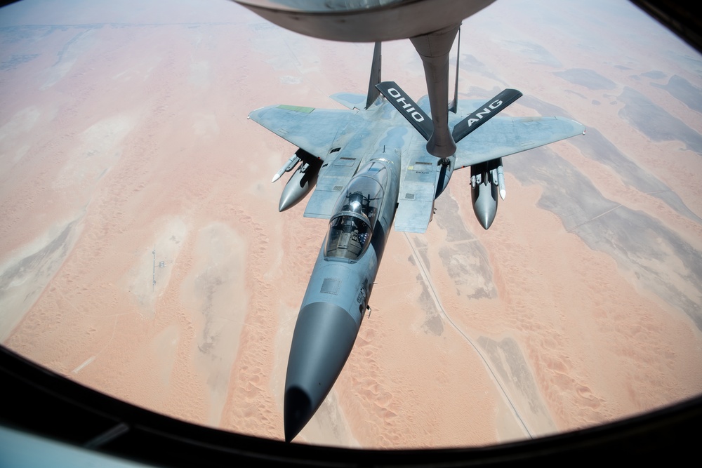 A U.S. Air Force KC-135 Stratotanker refuels F-15C Eagles