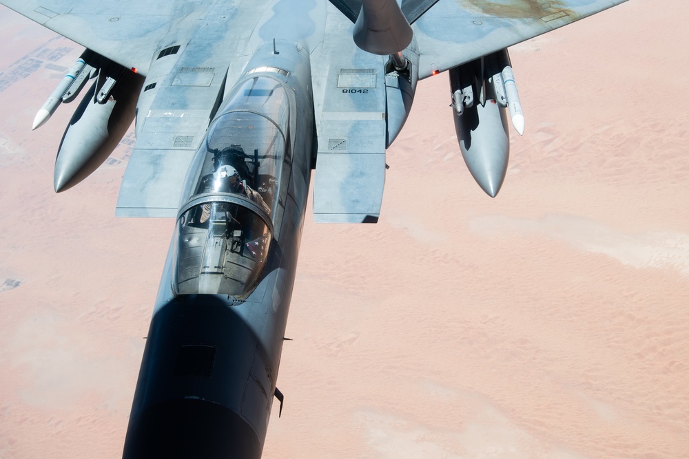 A U.S. Air Force KC-135 Stratotanker refuels F-15C Eagles