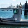 Security Tug Boat Rests Next To Pier Security Tug Boat Rests Next To Pier