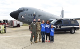 ‘Silver dollar salute’ comes full circle as 100th ARW fire chief reenlists