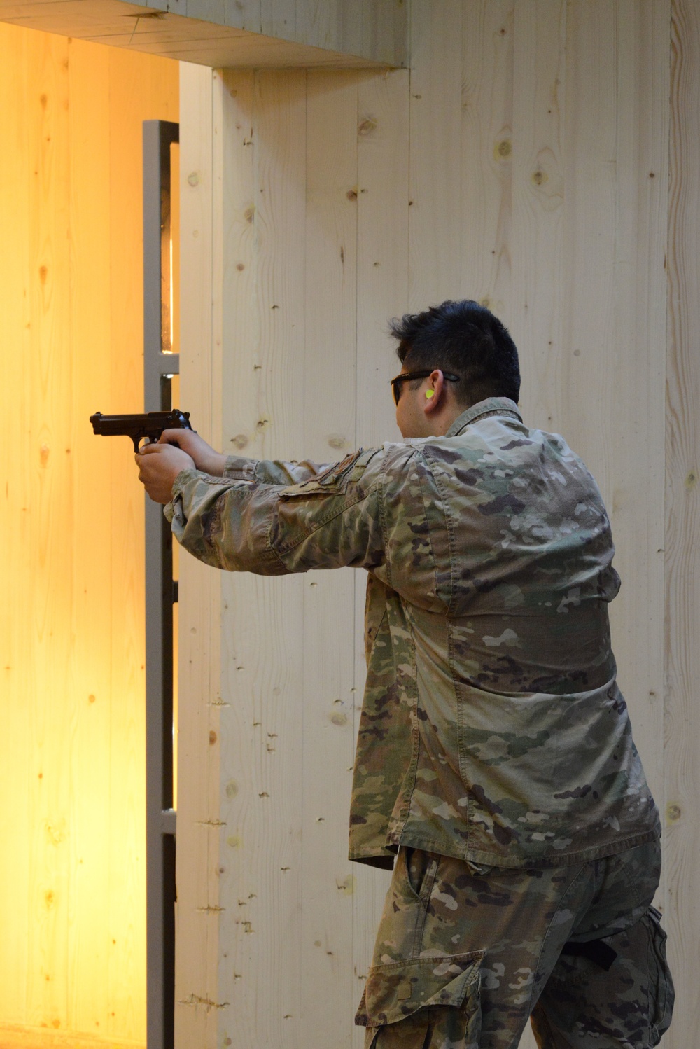 424TH Air Base Squadron on range indoor-M9 pistol and M4 rifle