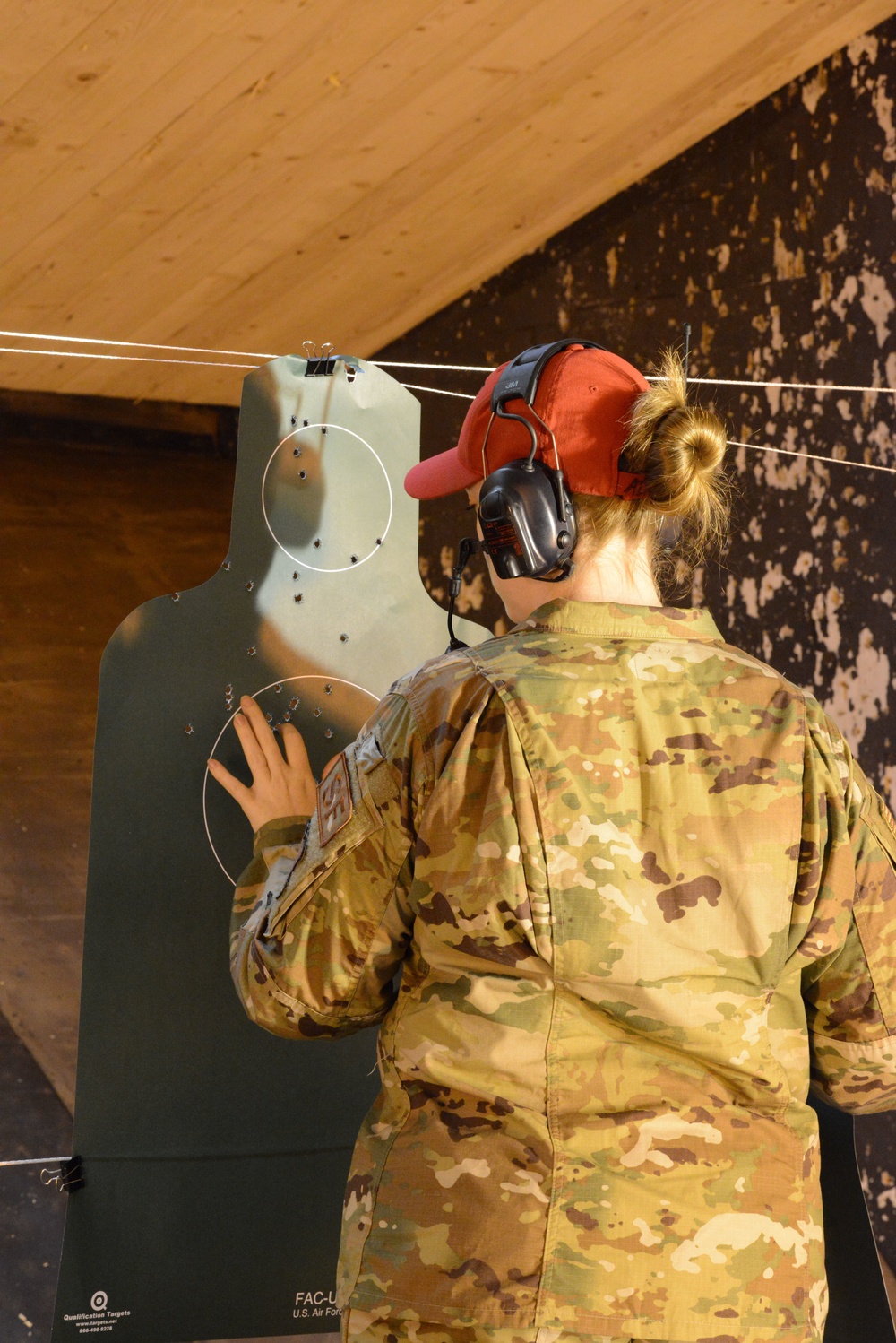 424TH Air Base Squadron on range indoor-M9 pistol and M4 rifle