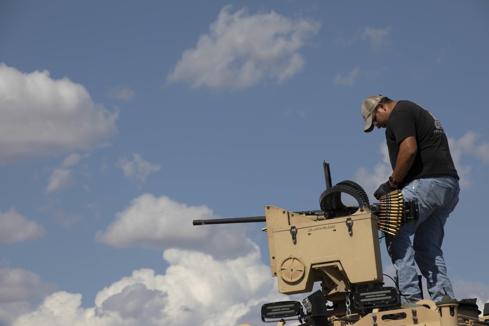 A contractor with CCDC prepares the NGCV Mine-Resistant Ambush Protected surrogate for a live-fire exercise during the Project Convergence capstone event at Yuma Proving Ground, Arizona, Aug. 11 – Sept. 18, 2020.
