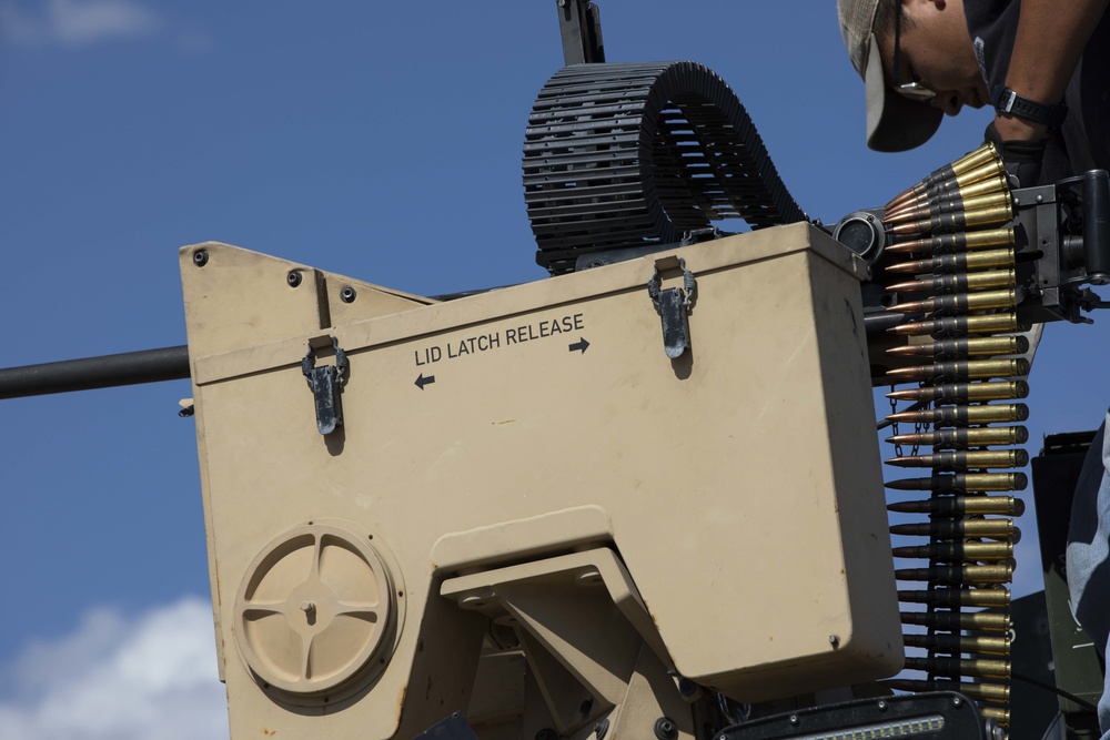 A contractor with CCDC prepares the NGCV Mine-Resistant Ambush Protected surrogate for a live-fire exercise during the Project Convergence capstone event at Yuma Proving Ground, Arizona, Aug. 11 – Sept. 18, 2020.