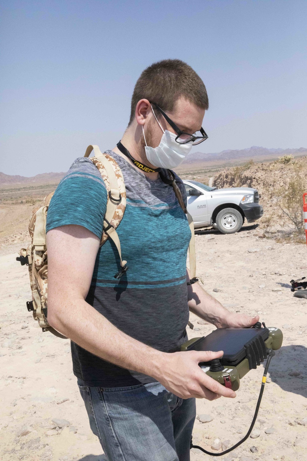 Jeremy Barker, software developer for Origin interface, prepares the vehicle's systems during the Project Convergence capstone event at Yuma Proving Ground, Arizona, Aug. 11 – Sept. 18, 2020.